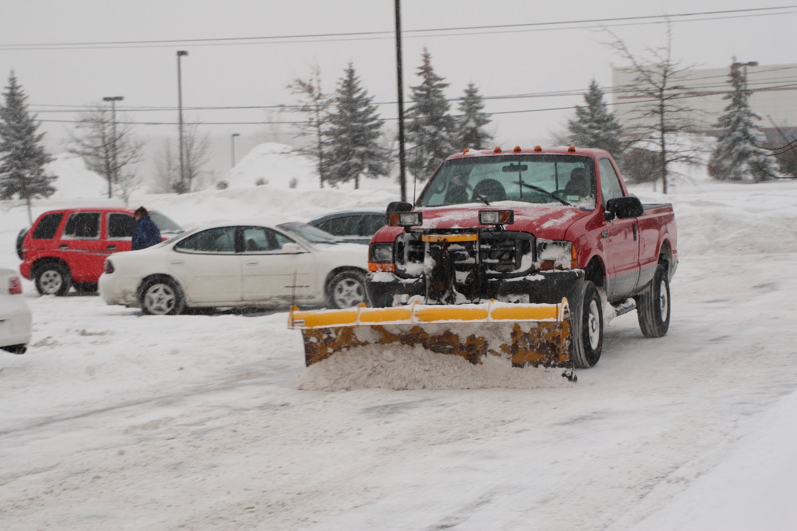 snow plow in the snowy road